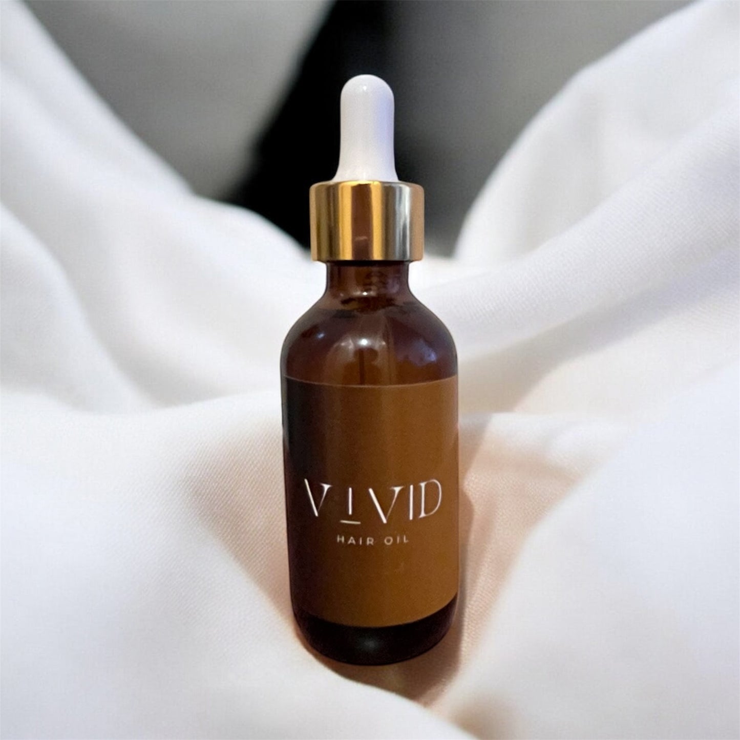 Mini vivid hair oil